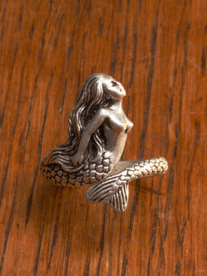 silver wrap around ring in the shape of a mermaid
