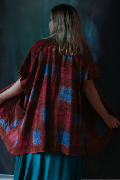 Woman showing back view of kimono