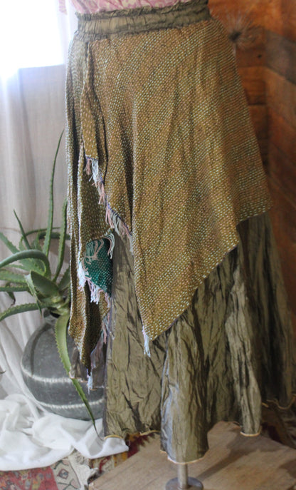 Side view of silk kantha skirt showing fringe detail